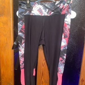 RNX brand Medium spandex polyester black with pink at the bottom colorful.